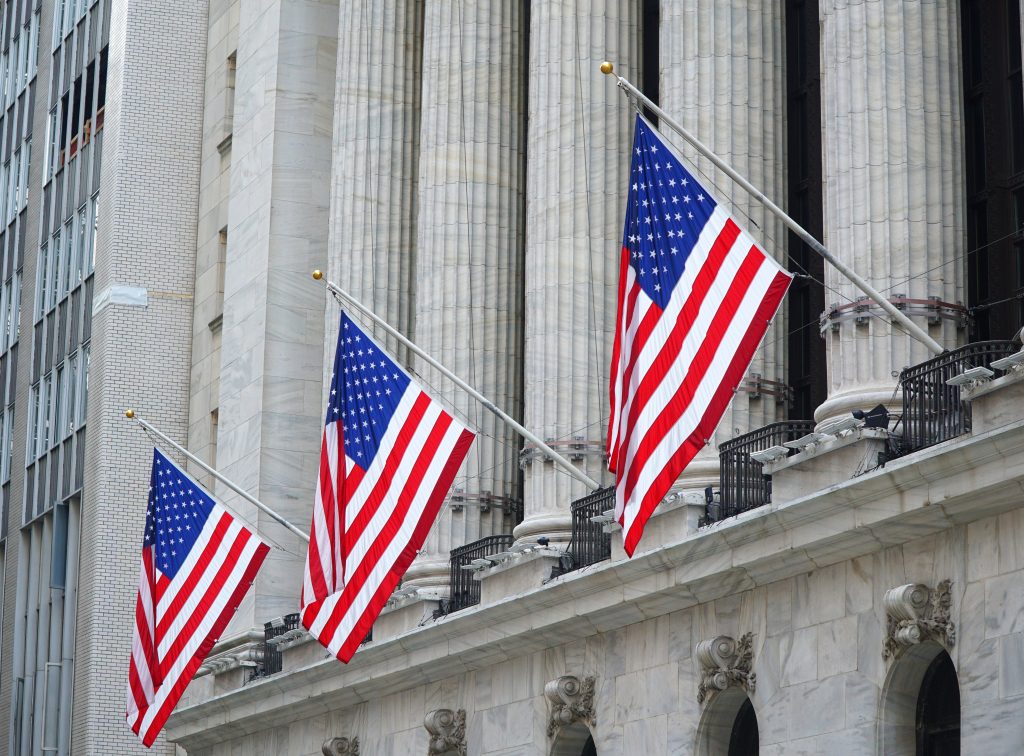 USA flag hanging in front of the government building